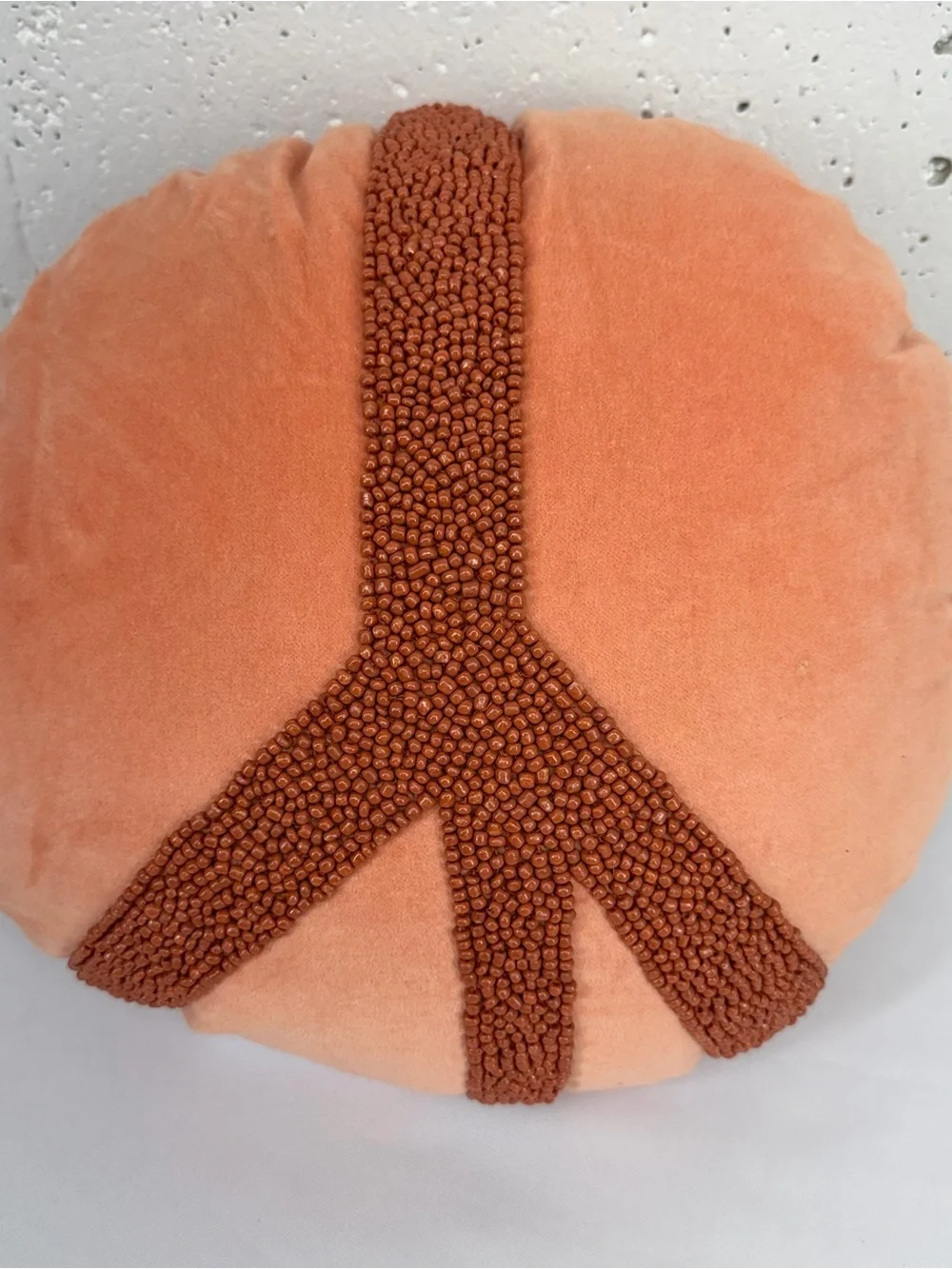 Opal House Round Peach Pillow with Beaded Peace Design 14”